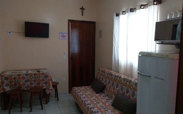 Apartamento de quarto na praia grande ubatuba 22E