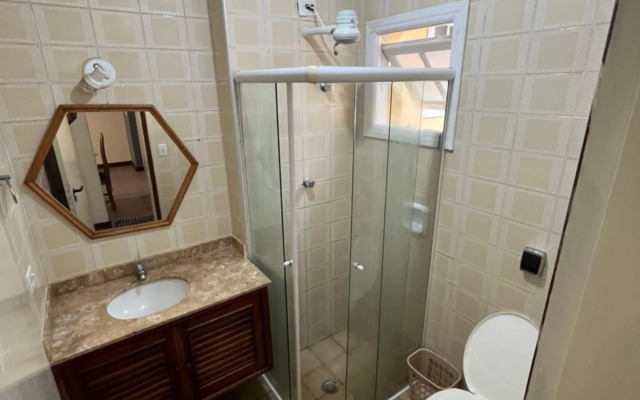 Apt TOTA 3 min Praia grande piscina e churrasqueira