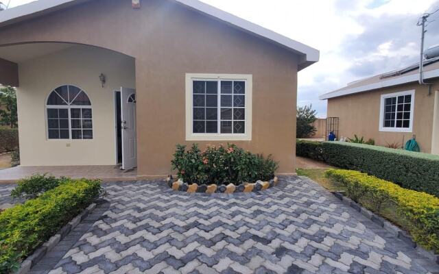 Charming 2-bed House in Portmore Gated Community