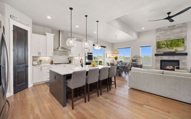 Upscale Waterfront Estate With Mountain Sunset Views