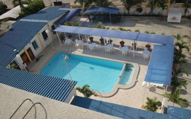 Hostal Palmeras Playa Milina