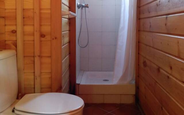 Attractive bungalow with a covered terrace, 1 km. from beach