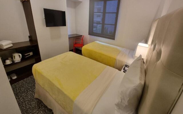 One Cristina Suites