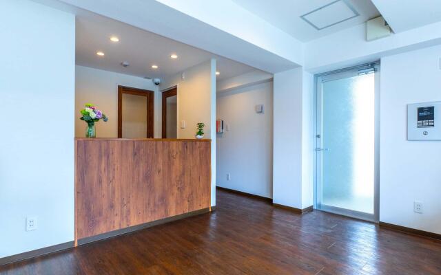 Mr.KINJO in front of Manza Beach