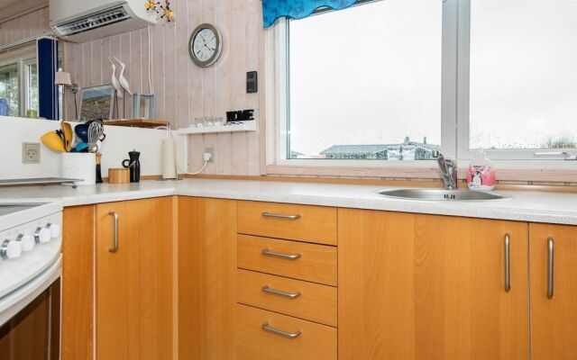 5 person holiday home on a holiday park in Glesborg