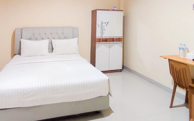 Urbanview Hotel Falah Residence Syariah By RedDoorz – Guest Rooms – Padang