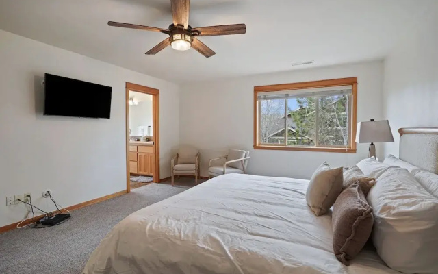 Professionally Decorated Shevlin Home features Private Hot Tub by RedAwning