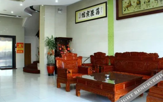 Wanlong Business Hotel