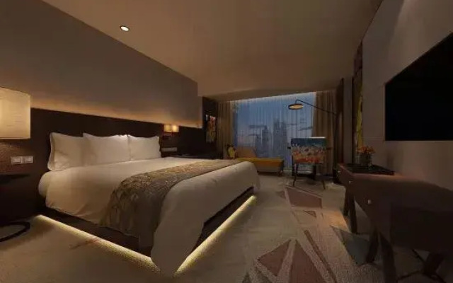 Chaoman Hotel (Suining Gymnasium Wanda Branch)