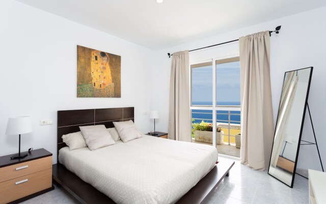 Duplex Acorán with pool and sea view