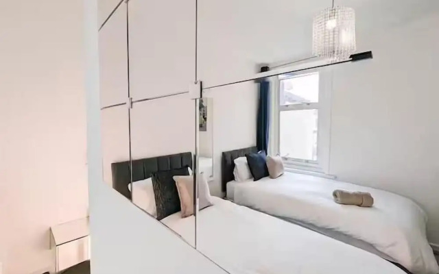 Central 3BR Home with Hot Tub Sleeps 10