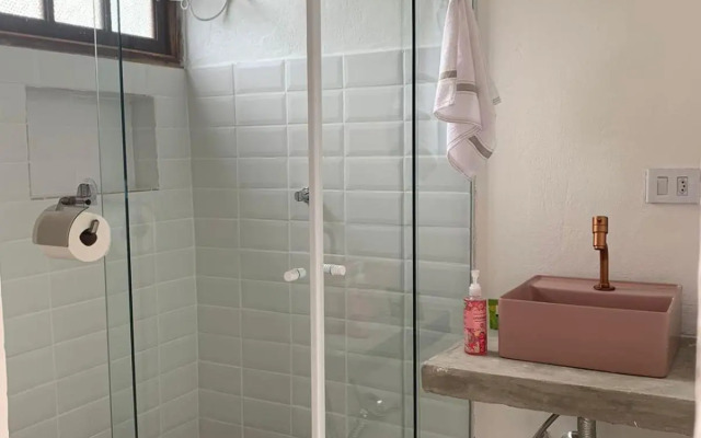 Apartamento com cachoeira no quintal