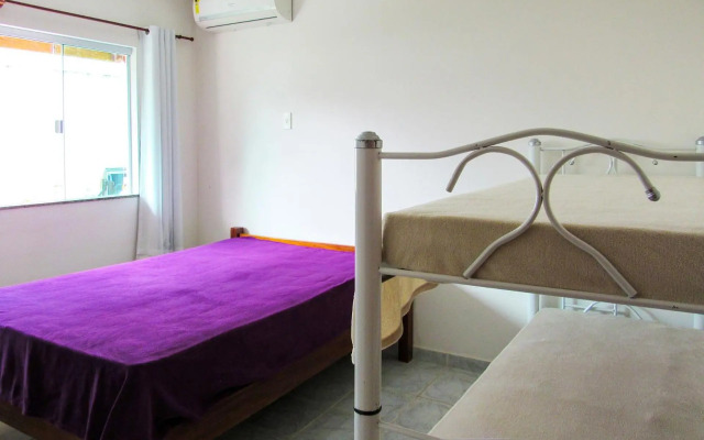 Casa com 4 Suítes, Piscina, Área Gourmet e Wifi