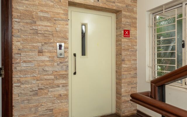 Cute Orange Service Apartments By OYO Rooms