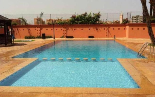 Nice cozy 2-bedroom appartment to relax with your family or friends! Enjoy the pool on a hot summerday