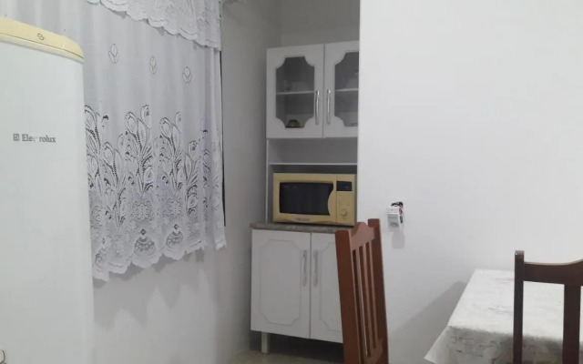 Casa 01 Dorm Terreno Compartido