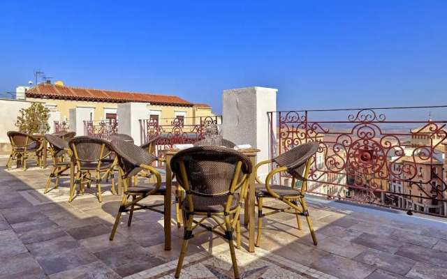 Отель Boutique Adolfo