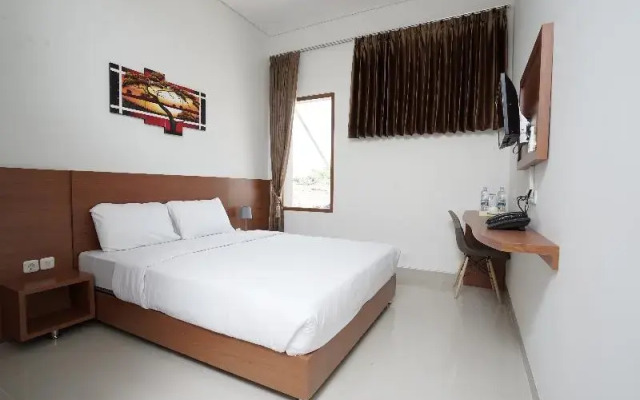 Capital O 1974 Grand Parigi Hotel