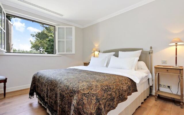 Provencal in a Height Overlooking Greenery