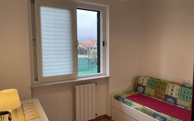 Snug holiday home in Loano with shared pool