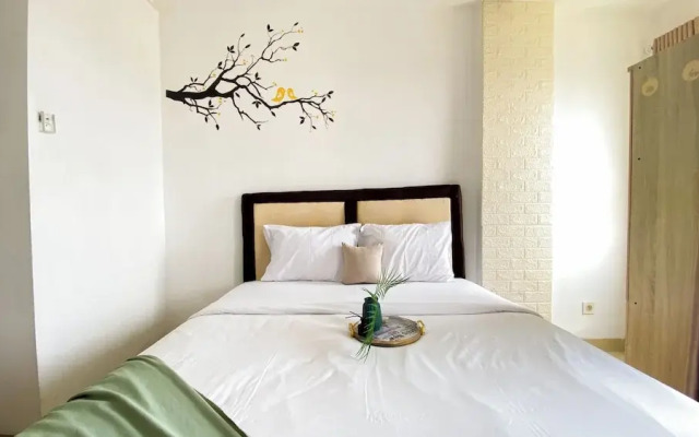 Homey And Cozy Living Studio At Poris 88 Apartment