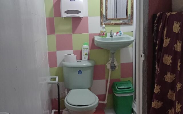 Room in Guest Room - Green Sea Inn in the San Luis Sector
