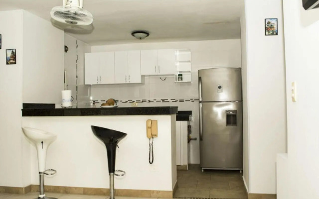 Apartamento con playa privada y piscina