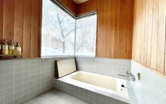 Dan Niseko こだわりの薪ストーブで暖かな時間を