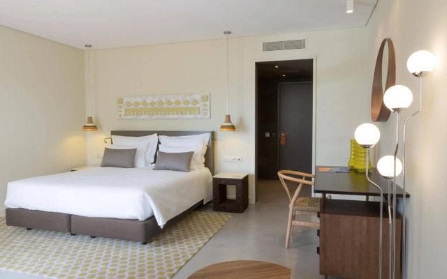 Ozadi Tavira Hotel
