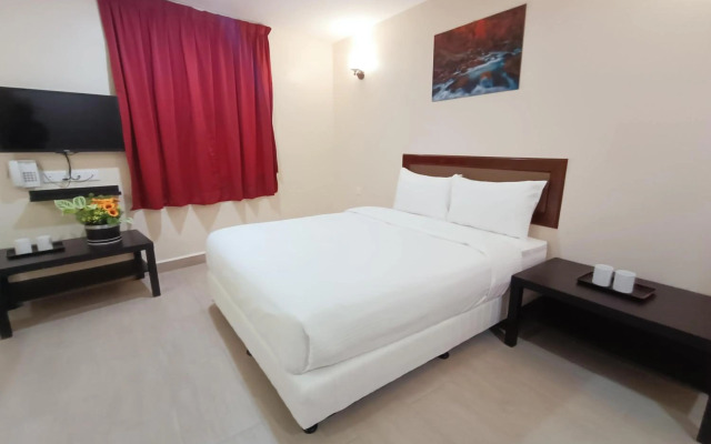 Capital O 90897 Island City Hotel