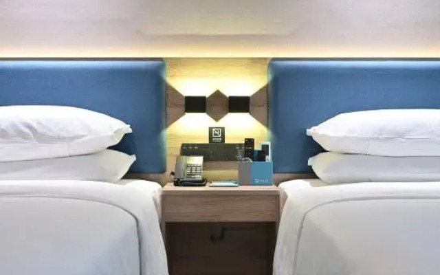 Happy Aile Hotel (Hezhou Lingfeng Square)