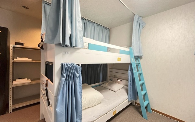 기숙사 내 침대 (여성용 기숙사) 사진 2