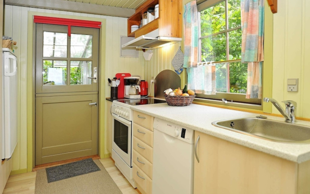 Magical Holiday Home with Barbecue in Otterup near Sea