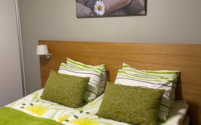 Дом у спа-центра и озера