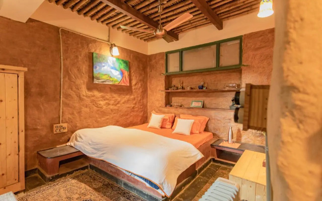 SaffronStays Kaivalya - pet-friendly sustainable mudhouse