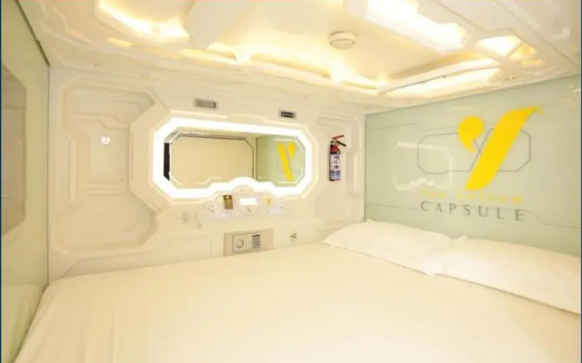 The Yellow Capsule Cancún