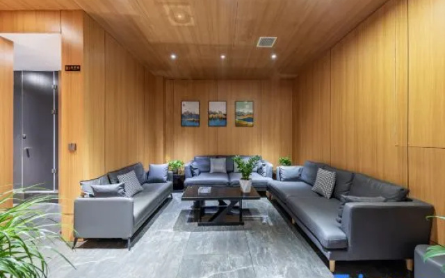 Ziyueqi Light Luxury Hotel (Meishan East Station Wanda Plaza)