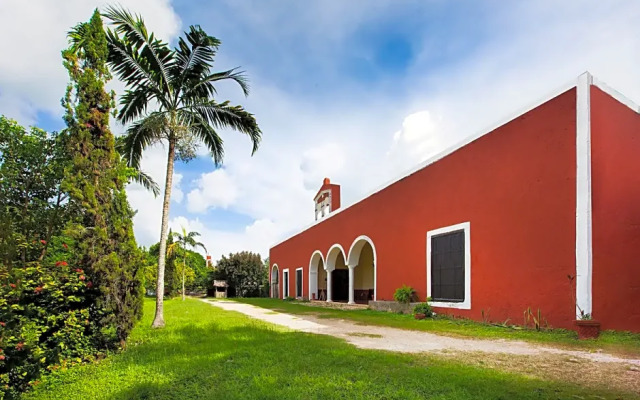 Capital O Hotel Hacienda Yunku