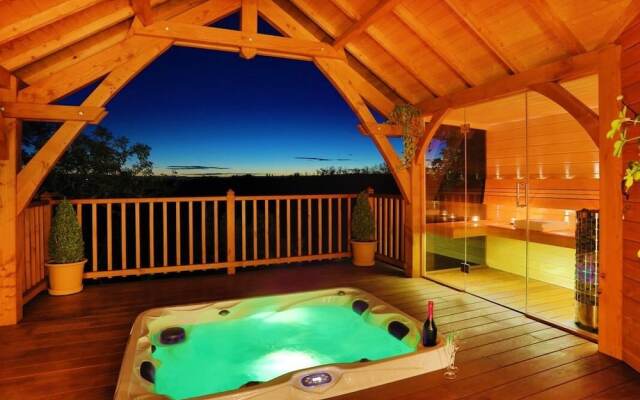 Cabane de Prestige avec Jacuzzi et Sauna privatifs