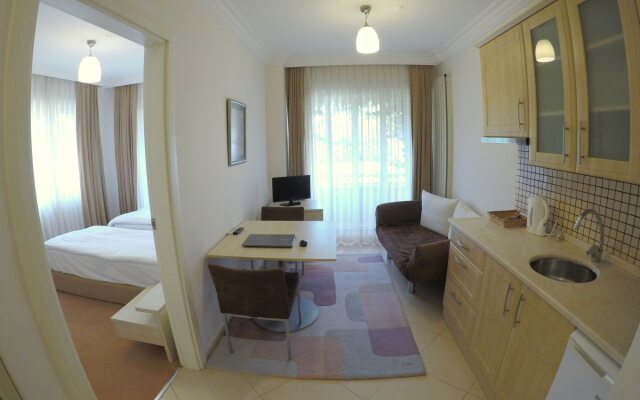 Kamer Suites & Hotel