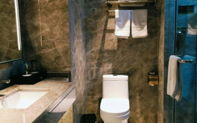 Jiayan Xintianli Hotel
