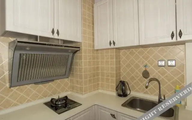 Dalian Xinghai Square Holiday Apartment