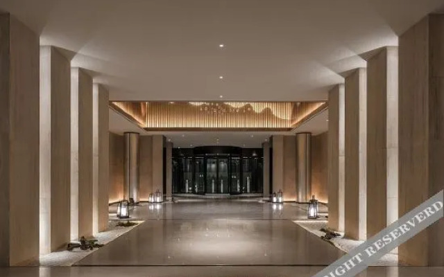 New Beacon Yunman Internation Hotel (Yingshan Tourist Center Chaxiang Small Town)