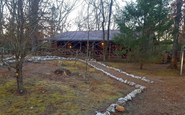 Cast Away Family Cabin with Hot Tub, Fireplace, and Kids Area by RedAwning