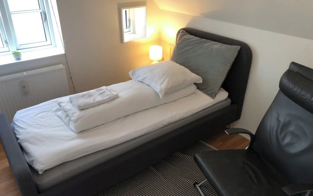 Huset ved springvandet
