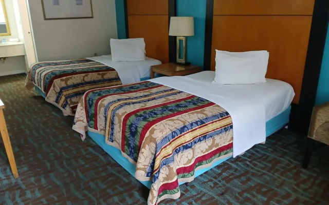 Apm Inn and Suite