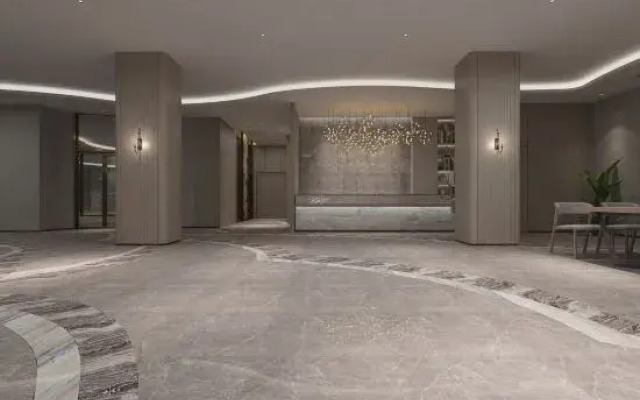 Wansheng Garden Hotel (Xinyang Luoshan Xiya Libao Plaza Branch)