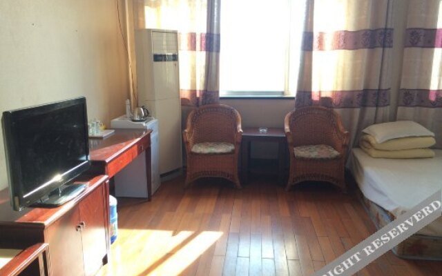 Xinjiayuan Business Hotel