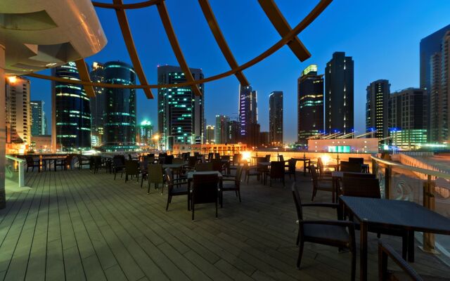 Magnum Hotel & Suites West Bay