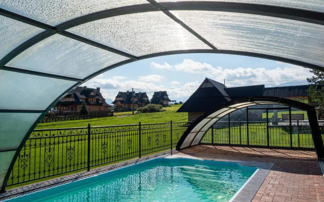Folk Resort Domki i Apartamenty